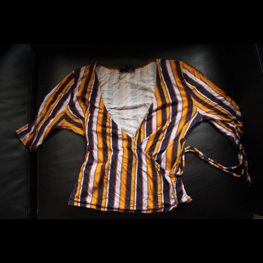 Striped light orange and blue short sleeved shirt